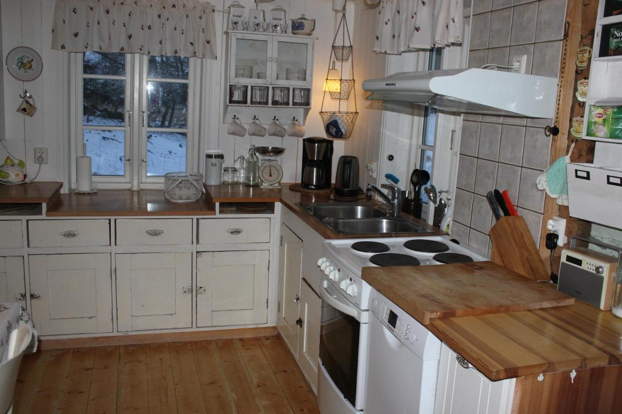 Kartveit Guesthouse Manger Extérieur photo
